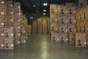 Boxes stacked in a warehouse leased by Howland Development in Wilmington, MA