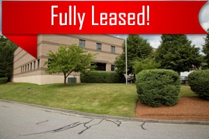 A piece of commercial real estate that is fully leased through Howland Development in Wilmington, MA